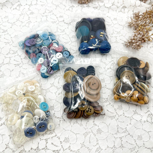 Bags of Blue and Neutral Buttons