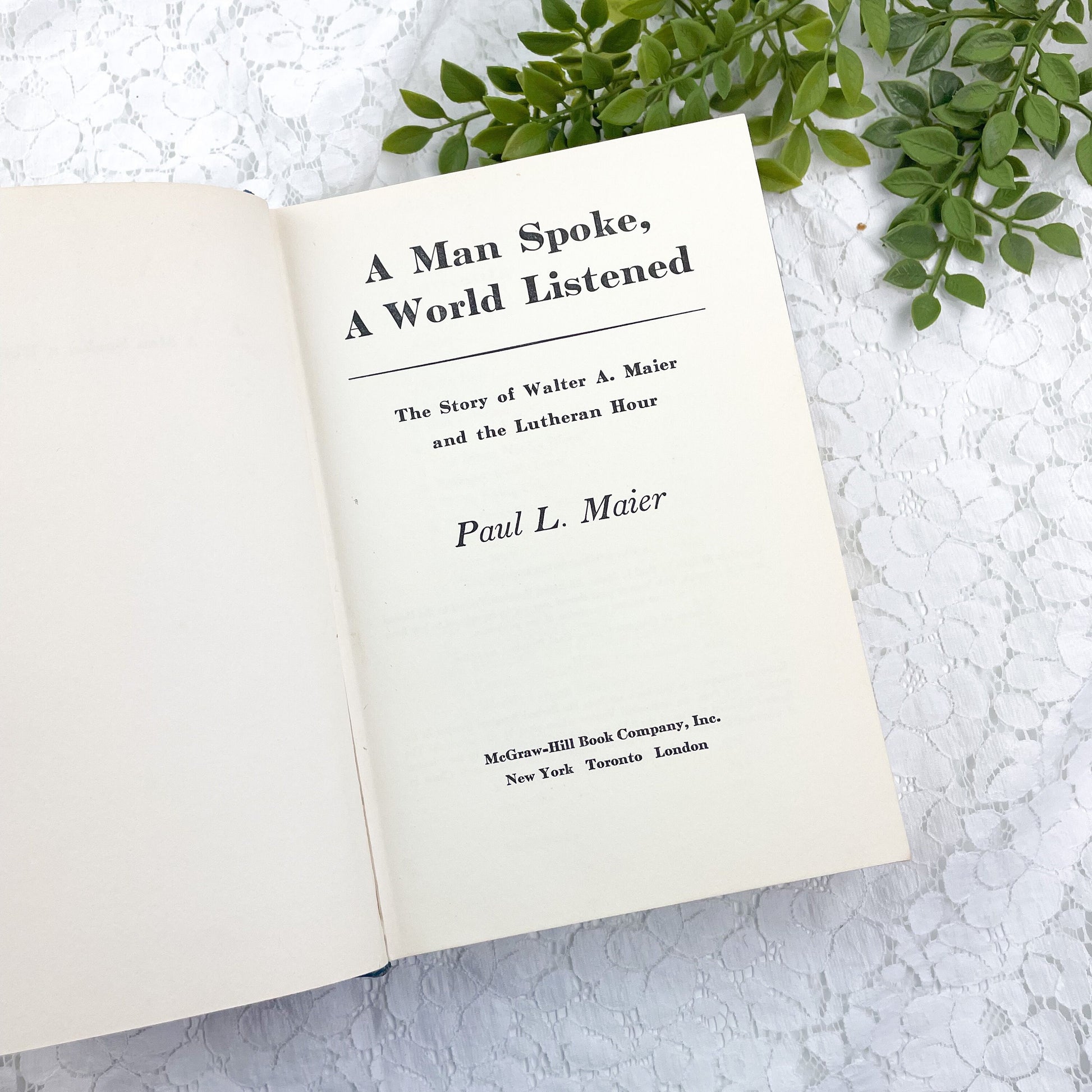 A Man Spoke, A World Listened signed by Paul L. Maier