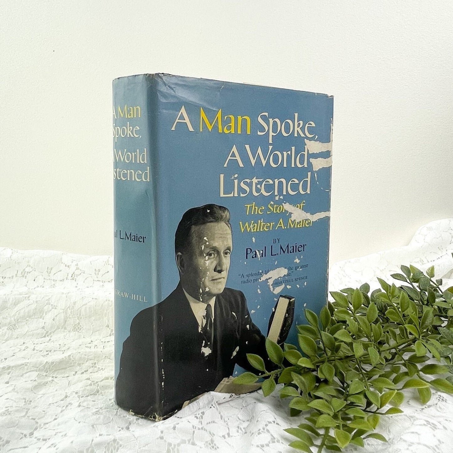 A Man Spoke, A World Listened signed by Paul L. Maier